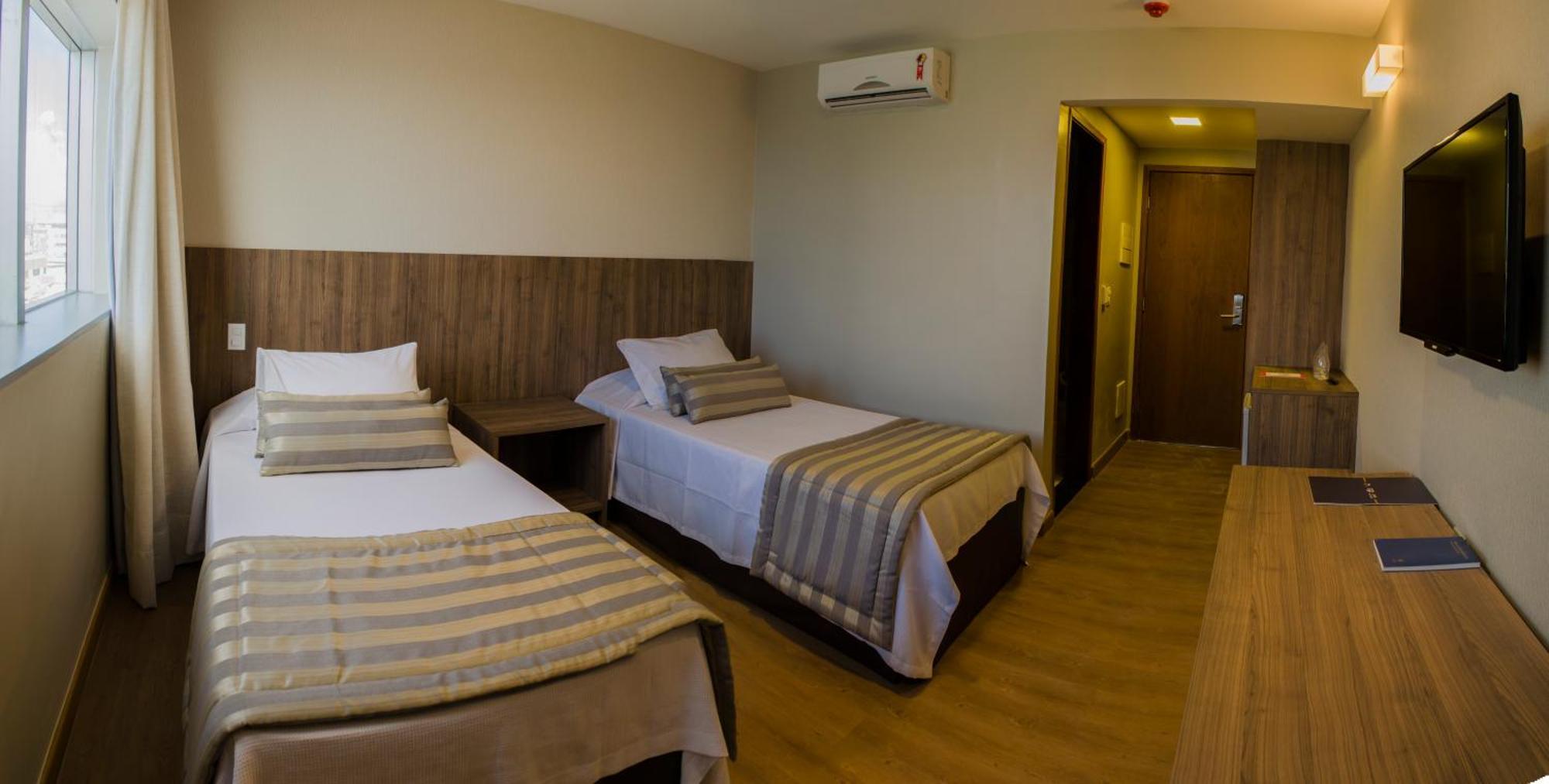 Quarto Luxo com 2 Camas de Solteiro